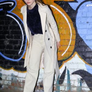 a person in a white coat