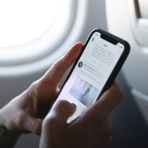 person holding space gray iPhone X